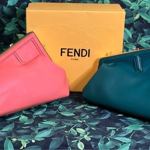 Designer clutch has strap available in green and coral